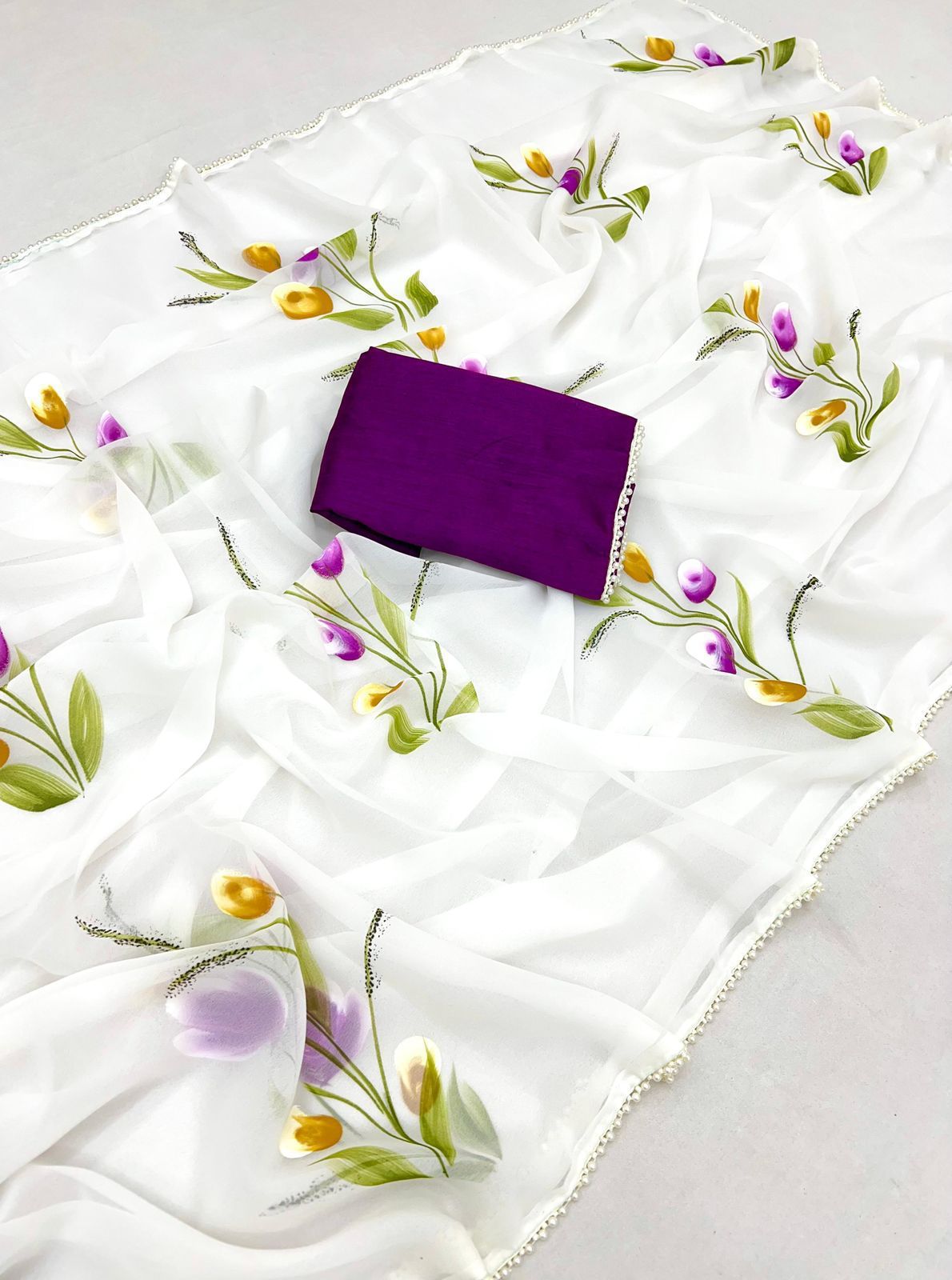 New Designer Georgette Fabric With Beautiful Floral Handbrush Print And Fancy Pearl (Moti) Lace Bordar With Contrast Art Silk Blouse