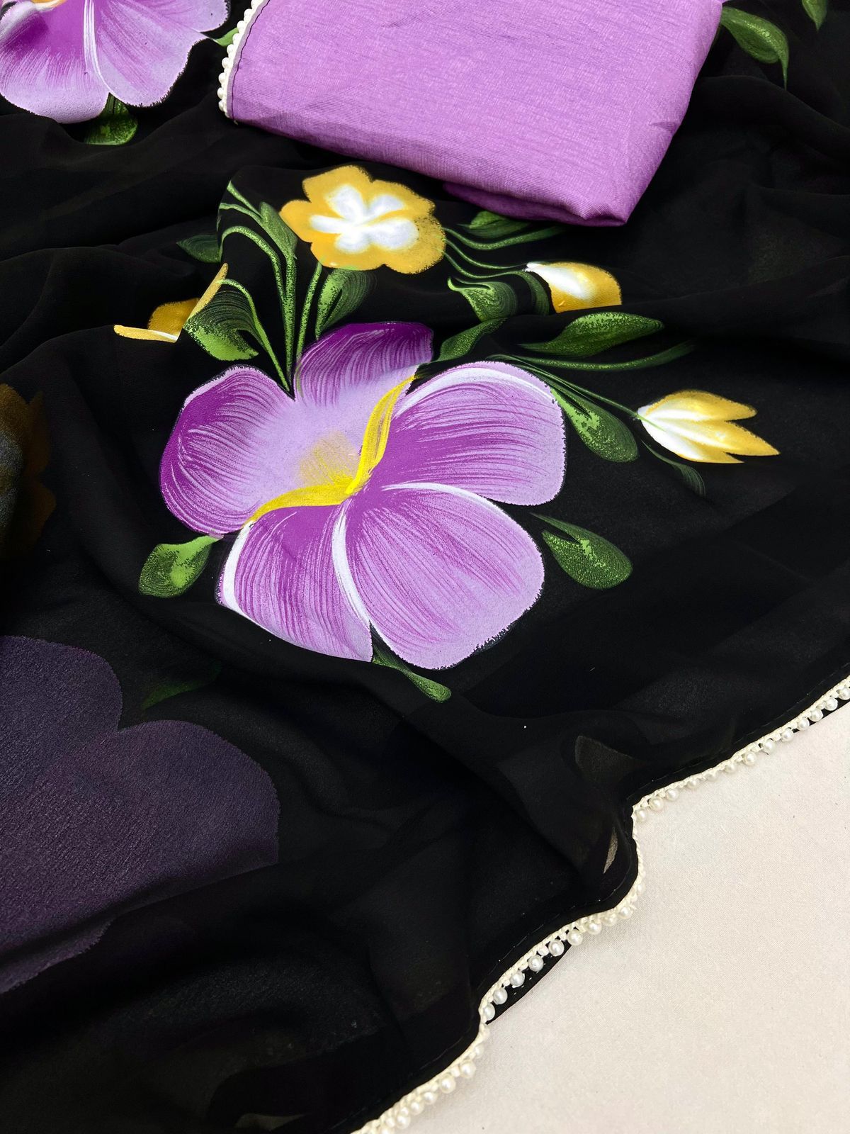 New Designer Georgette Fabric With Beautiful Floral Handbrush Print And Fancy Pearl (Moti) Lace Bordar With Contrast Art Silk Blouse